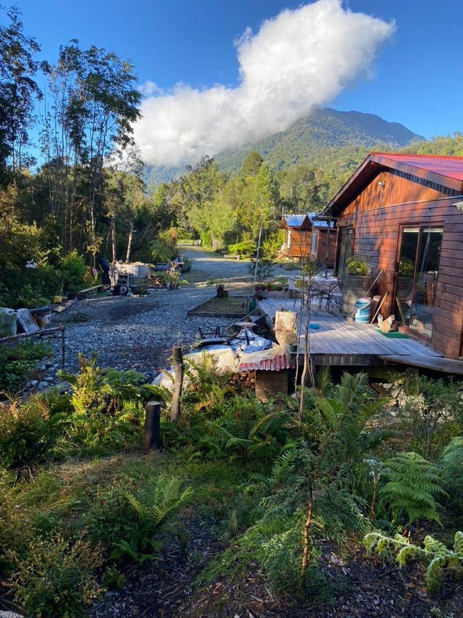 Cabanas & Tinajas Entre Volcanes Hornopiren Exteriör bild